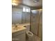 Bathroom with shower/tub combo and updated vanity at 10630 W Roundelay Cir, Sun City, AZ 85351