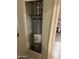 Interior view of the home's water heater closet at 10630 W Roundelay Cir, Sun City, AZ 85351