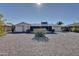 Backyard view of home, showing screened patio at 10722 W Loma Blanca Dr, Sun City, AZ 85351