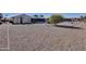 Large backyard with gravel and mature landscaping at 10722 W Loma Blanca Dr, Sun City, AZ 85351