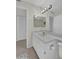 Bright bathroom featuring a vanity and toilet at 10722 W Loma Blanca Dr, Sun City, AZ 85351