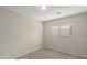 Simple bedroom with neutral walls and carpet flooring at 11261 E Quarry Ave, Mesa, AZ 85212