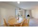 Bright dining room with a view and fireplace at 12012 N Saguaro Blvd # 6, Fountain Hills, AZ 85268