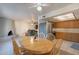 Bright kitchen with wood cabinets, stainless steel appliances, and an adjacent dining area at 12012 N Saguaro Blvd # 6, Fountain Hills, AZ 85268