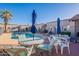 Sparkling community pool with multiple seating areas at 12012 N Saguaro Blvd # 6, Fountain Hills, AZ 85268