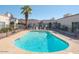 Inviting kidney-shaped community pool with ample surrounding space at 12012 N Saguaro Blvd # 6, Fountain Hills, AZ 85268