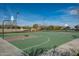 Community outdoor basketball court with two hoops at 12064 S 186Th Ave, Goodyear, AZ 85338