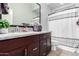 Bathroom with granite countertop and shower/tub combo at 12064 S 186Th Ave, Goodyear, AZ 85338