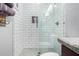 Modern bathroom with subway tile shower and granite vanity at 12064 S 186Th Ave, Goodyear, AZ 85338