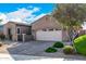 Single story home with a two car garage and drought resistant landscaping at 12064 S 186Th Ave, Goodyear, AZ 85338