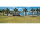 Lakefront view with fountains and a walking path at 12064 S 186Th Ave, Goodyear, AZ 85338