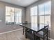 Bright dining area with ample windows, showcasing a modern table and chair set at 1255 N Arizona Ave # 1255, Chandler, AZ 85225