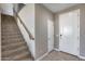 Welcoming entryway featuring a staircase and a neutral color scheme at 1255 N Arizona Ave # 1255, Chandler, AZ 85225