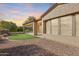 Artificial turf and gravel backyard with covered patio at 12629 W Bajada Rd, Peoria, AZ 85383