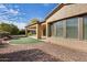 Artificial turf and gravel backyard with covered patio at 12629 W Bajada Rd, Peoria, AZ 85383