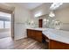 Spacious bathroom with double sinks, a large mirror, and a separate shower at 12629 W Bajada Rd, Peoria, AZ 85383