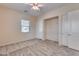 Spacious bedroom with double closets and ceiling fan at 12629 W Bajada Rd, Peoria, AZ 85383