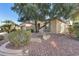 One-story home showcasing a mature tree and rock landscaping at 12629 W Bajada Rd, Peoria, AZ 85383