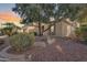 Tan house with a tree and rock landscaping at 12629 W Bajada Rd, Peoria, AZ 85383