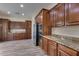 Modern kitchen with stainless steel appliances and rich wood cabinetry at 12629 W Bajada Rd, Peoria, AZ 85383