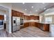 Well-equipped kitchen with stainless steel appliances and wood cabinets at 12629 W Bajada Rd, Peoria, AZ 85383