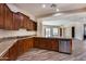 Open concept kitchen with granite counters and stainless steel appliances at 12629 W Bajada Rd, Peoria, AZ 85383