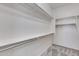 Large walk-in closet with ample shelving and hanging space at 12629 W Bajada Rd, Peoria, AZ 85383