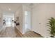 Bright and spacious entryway with hardwood floors and modern console table at 1321 W Inca Dr, Coolidge, AZ 85128