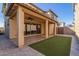 Covered patio, grassy area, and block wall at 1349 N Balboa --, Mesa, AZ 85205