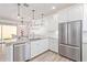 Modern kitchen with stainless steel appliances and white cabinets at 1349 N Balboa --, Mesa, AZ 85205