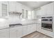 Modern kitchen with white cabinets and granite countertops at 1349 N Balboa --, Mesa, AZ 85205