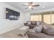 Living Room with sectional sofa and large TV at 1349 N Balboa --, Mesa, AZ 85205