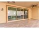 Covered patio with view into home's interior at 1349 N Balboa --, Mesa, AZ 85205