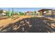 playground with climbing equipment and shaded seating at 1349 N Balboa --, Mesa, AZ 85205