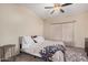 Bright bedroom with a king-size bed and neutral decor at 14836 W Desert Hills Dr, Surprise, AZ 85379