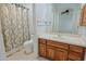 Clean bathroom with shower/tub combo and wood vanity at 14850 E Grandview Dr # 138, Fountain Hills, AZ 85268