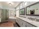 Elegant bathroom with a soaking tub, double vanity, and a walk-in shower at 16205 S 7Th St, Phoenix, AZ 85048