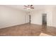 Large bedroom with tile flooring and access to bathroom at 16205 S 7Th St, Phoenix, AZ 85048