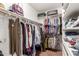 Large walk-in closet with plenty of shelving and hanging space at 16205 S 7Th St, Phoenix, AZ 85048