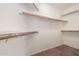 Walk-in closet with ample shelving and hanging space at 16205 S 7Th St, Phoenix, AZ 85048