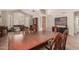 Bright dining room featuring a large wooden table and chairs at 16205 S 7Th St, Phoenix, AZ 85048