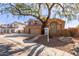 Two-story house with a three-car garage and mature shade tree at 16205 S 7Th St, Phoenix, AZ 85048