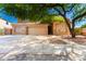 Two-story house with a large driveway and landscaping at 16205 S 7Th St, Phoenix, AZ 85048