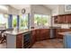 Well-equipped kitchen featuring granite countertops and a breakfast bar at 16205 S 7Th St, Phoenix, AZ 85048