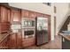 Modern kitchen with stainless steel appliances and granite countertops at 16205 S 7Th St, Phoenix, AZ 85048