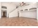 Two-story living room with tile floors, high ceilings, and a loft area at 16205 S 7Th St, Phoenix, AZ 85048