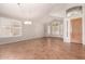 Spacious living room with tile floors and plantation shutters at 16205 S 7Th St, Phoenix, AZ 85048