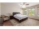 Spacious main bedroom with a large bed and ensuite bathroom access at 16205 S 7Th St, Phoenix, AZ 85048