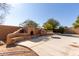 Outdoor patio with fireplace, grill, and seating area at 16205 S 7Th St, Phoenix, AZ 85048