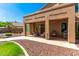 Covered patio with seating area, ceiling fans and a built-in heater at 16205 S 7Th St, Phoenix, AZ 85048